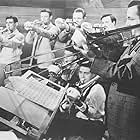 Trigger Alpert, Ray Anthony, Tex Beneke, Johnny Best, Ernie Caceres, Frank D'Annolfo, Ray Eberle, Paula Kelly, Al Klink, Jack Lathrop, Chummy MacGregor, Billy May, Dale McMickle, Jimmy Priddy, Moe Purtill, Wilbur Schwartz, Paul Tanner, and Glenn Miller and His Orchestra in Sun Valley Serenade (1941)
