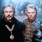 Malcolm McDowell and Edward Woodward in Arthur the King (1983)