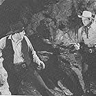 Roy Barcroft and Eddie Dew in Raiders of Sunset Pass (1943)