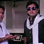 Govinda and Satish Kaushik in Swarg (1990)