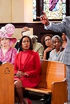 Tichina Arnold, Cedric The Entertainer, Max Greenfield, and Beth Behrs in Welcome to the New Pastor (2020)