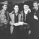 Oliver Drake, James Newill, Dave O'Brien, and Guy Wilkerson in West of Texas (1943)