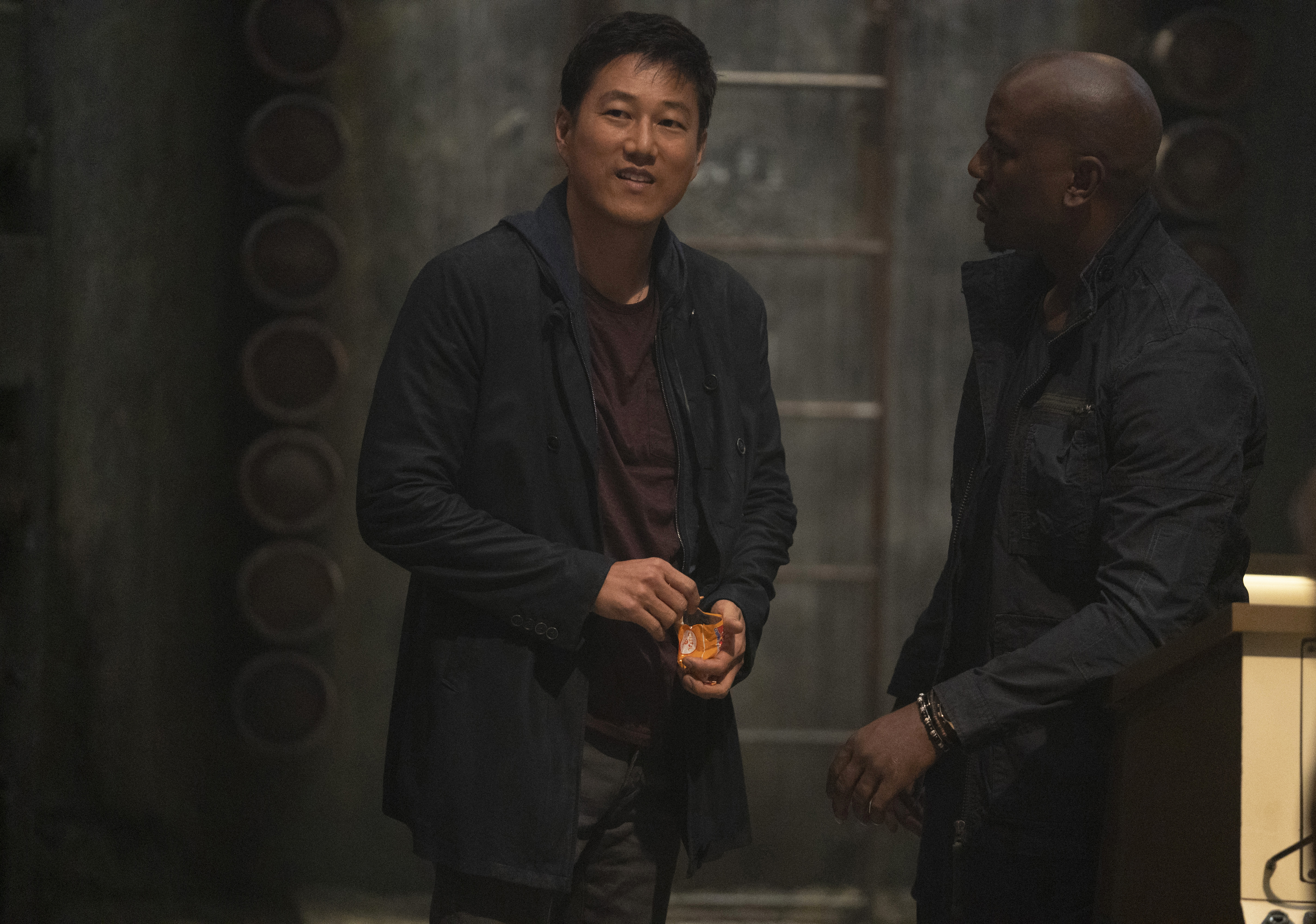 Sung Kang and Tyrese Gibson in F9: The Fast Saga (2021)