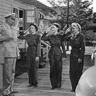 Agnes Moorehead, Lana Turner, Laraine Day, Clyde Fillmore, and Susan Peters in Keep Your Powder Dry (1945)