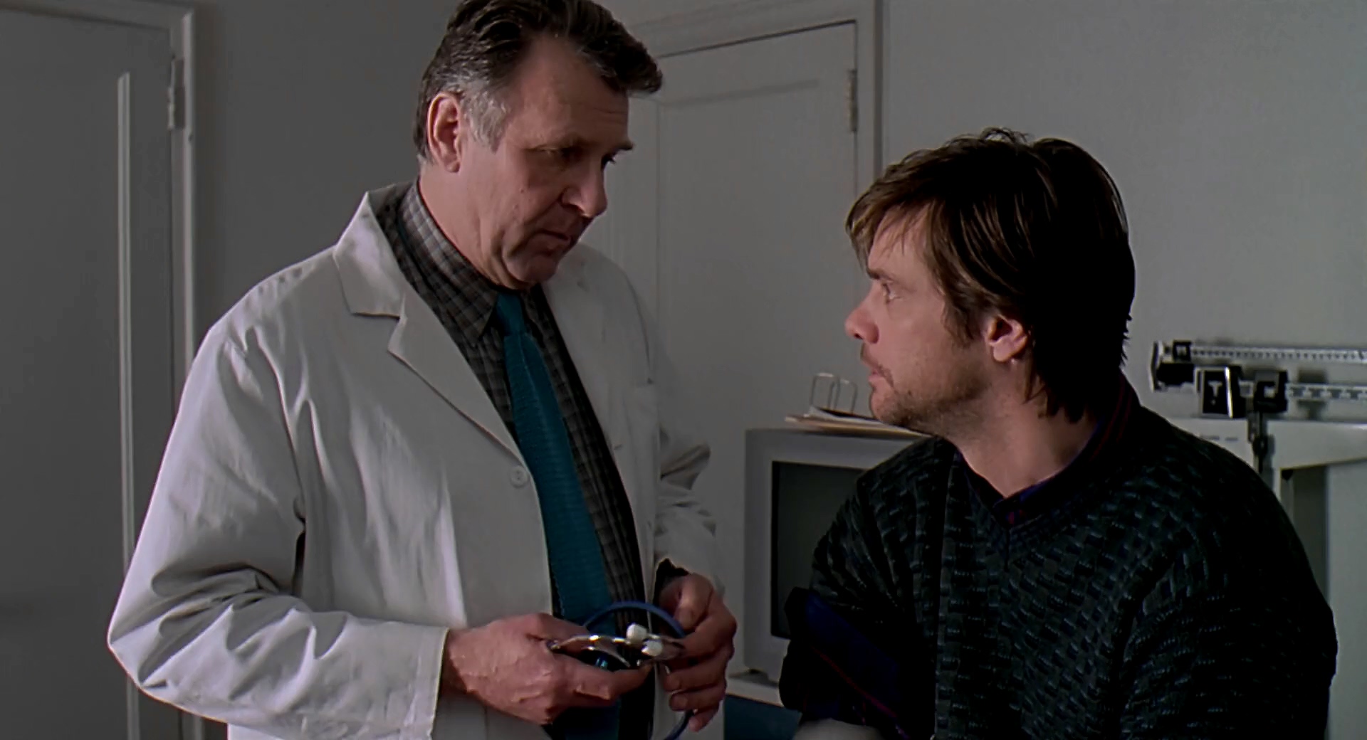 Jim Carrey and Tom Wilkinson in Eternal Sunshine of the Spotless Mind (2004)