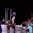 Madonna, Addie Yungmee, Mihran Kirakosian, and Daniel 'Cloud' Campos in Madonna: The Confessions Tour (2006)