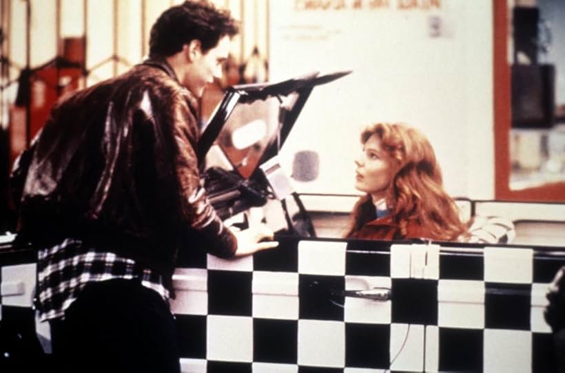 Page Hannah and Raphael Sbarge in My Man Adam (1985)