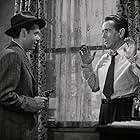 Humphrey Bogart and Clifton Young in Dark Passage (1947)