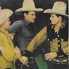 John Wayne, Yakima Canutt, and Tommy Coats in Randy Rides Alone (1934)