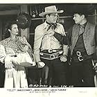 Ray Bennett, Charles Starrett, and Luana Walters in Lawless Plainsmen (1942)