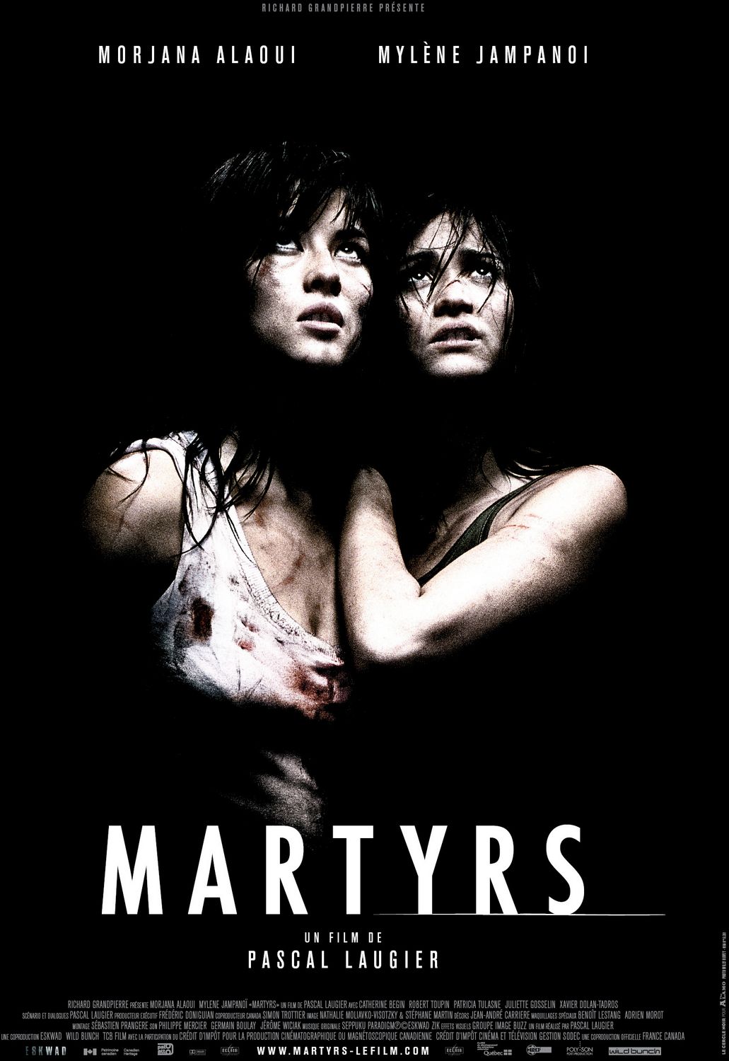 Mylène Jampanoï and Morjana Alaoui in Martyrs (2008)