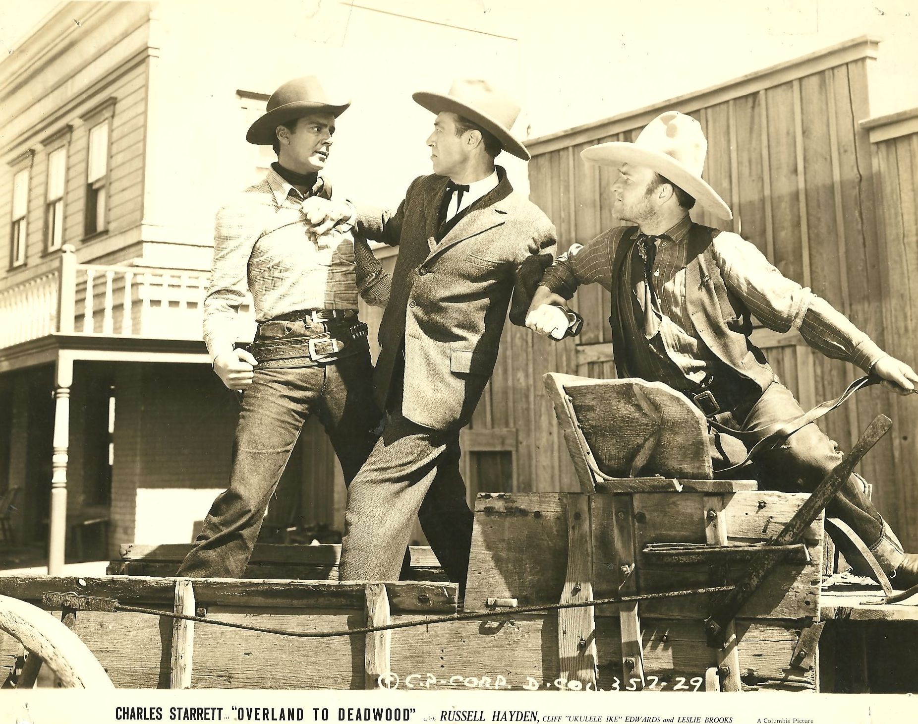 Russell Hayden, Art Mix, and Norman Willis in Overland to Deadwood (1942)