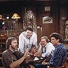 Ted Danson, George Wendt, Glen Charles, and Norm Peterson in Cheers (1982)