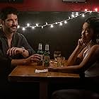 Tom Ellis and Gina Rodriguez in Players (2024)