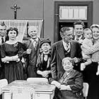 Amanda Alarie, Rolland Bédard, Paul Guèvremont, Doris Lussier, Denise Pelletier, Jean-Louis Roux, Pierre Valcour, and Nana de Varennes in La famille Plouffe (1953)