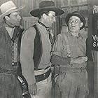 John Wayne, Lane Chandler, and Lew Kelly in Winds of the Wasteland (1936)