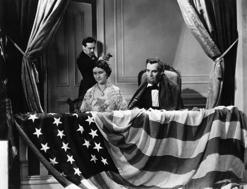 Kay Hammond, Walter Huston, and Ian Keith in Abraham Lincoln (1930)