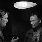 Tom Courtenay and John Mills in King Rat (1965)