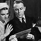 Dick Purcell and Ann Sheridan in Mystery House (1938)