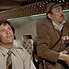 Robert Hays and James Hong in Airplane! (1980)