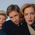 Gillian Anderson, David Duchovny, and Dana Wheeler-Nicholson in The X-Files (1993)