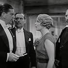 Leslie Banks, Edna Best, and Tony De Lungo in The Man Who Knew Too Much (1934)