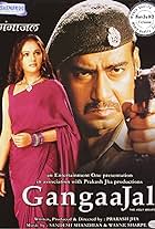 Ajay Devgn and Gracy Singh in Gangaajal (2003)