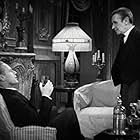 Leslie Howard and Ivan F. Simpson in British Agent (1934)