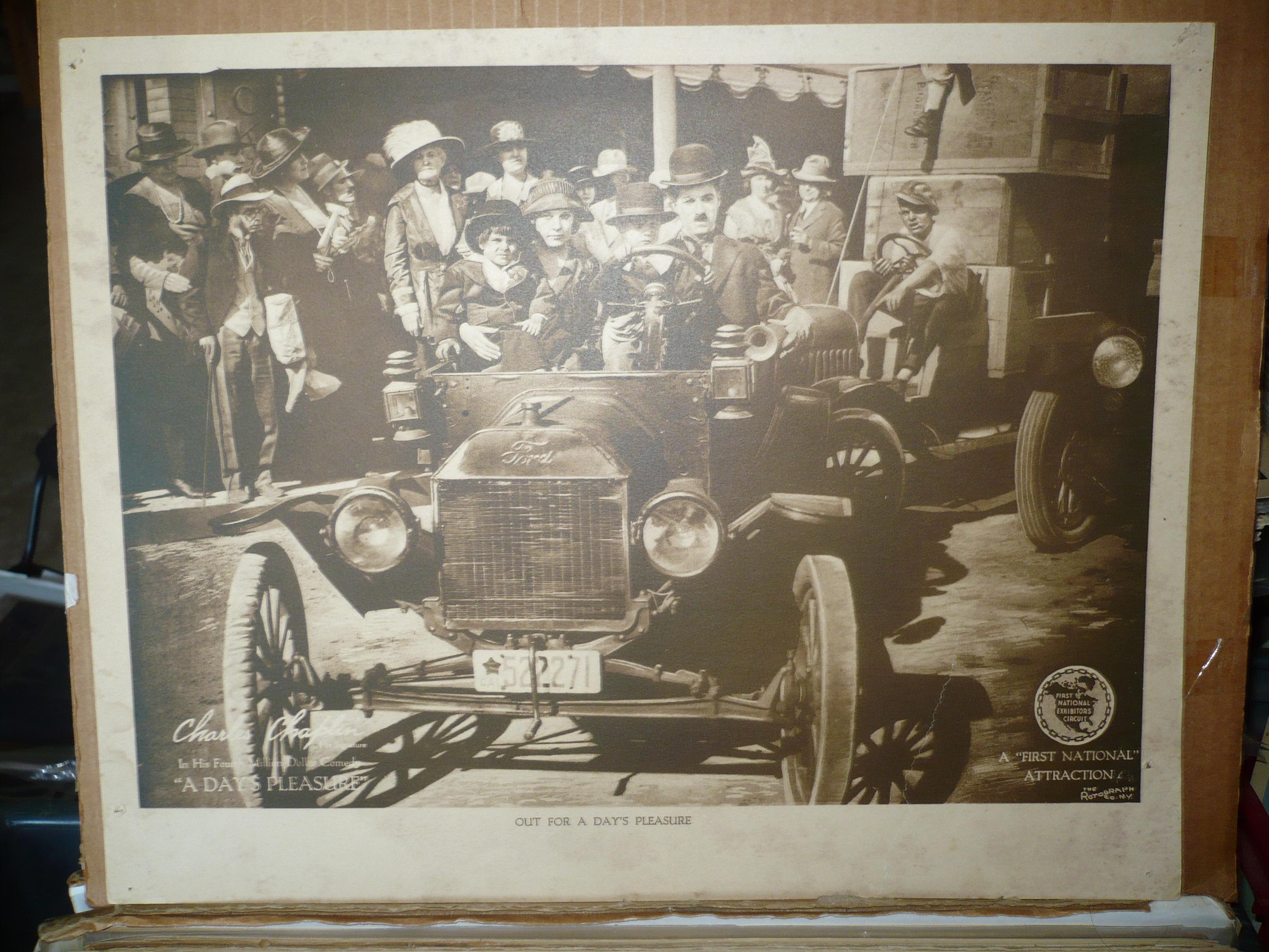 Charles Chaplin, Bliss Chevalier, Marion Feducha, Bob Kelly, Edna Purviance, Loyal Underwood, and Virginia Ware in A Day's Pleasure (1919)