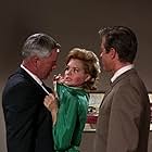 Angie Dickinson, Lee Marvin, and Clu Gulager in The Killers (1964)