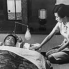 Yûzô Kayama and Yôko Tsukasa in Scattered Clouds (1967)