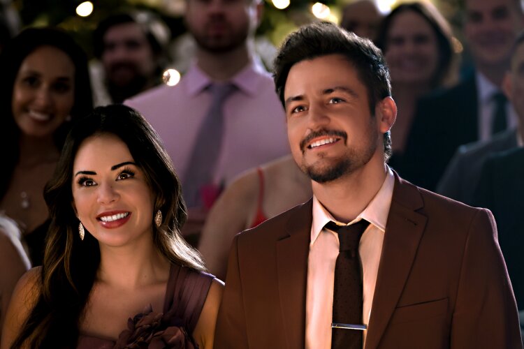 Tyler Hynes and Janel Parrish in Never Been Chris'd (2023)