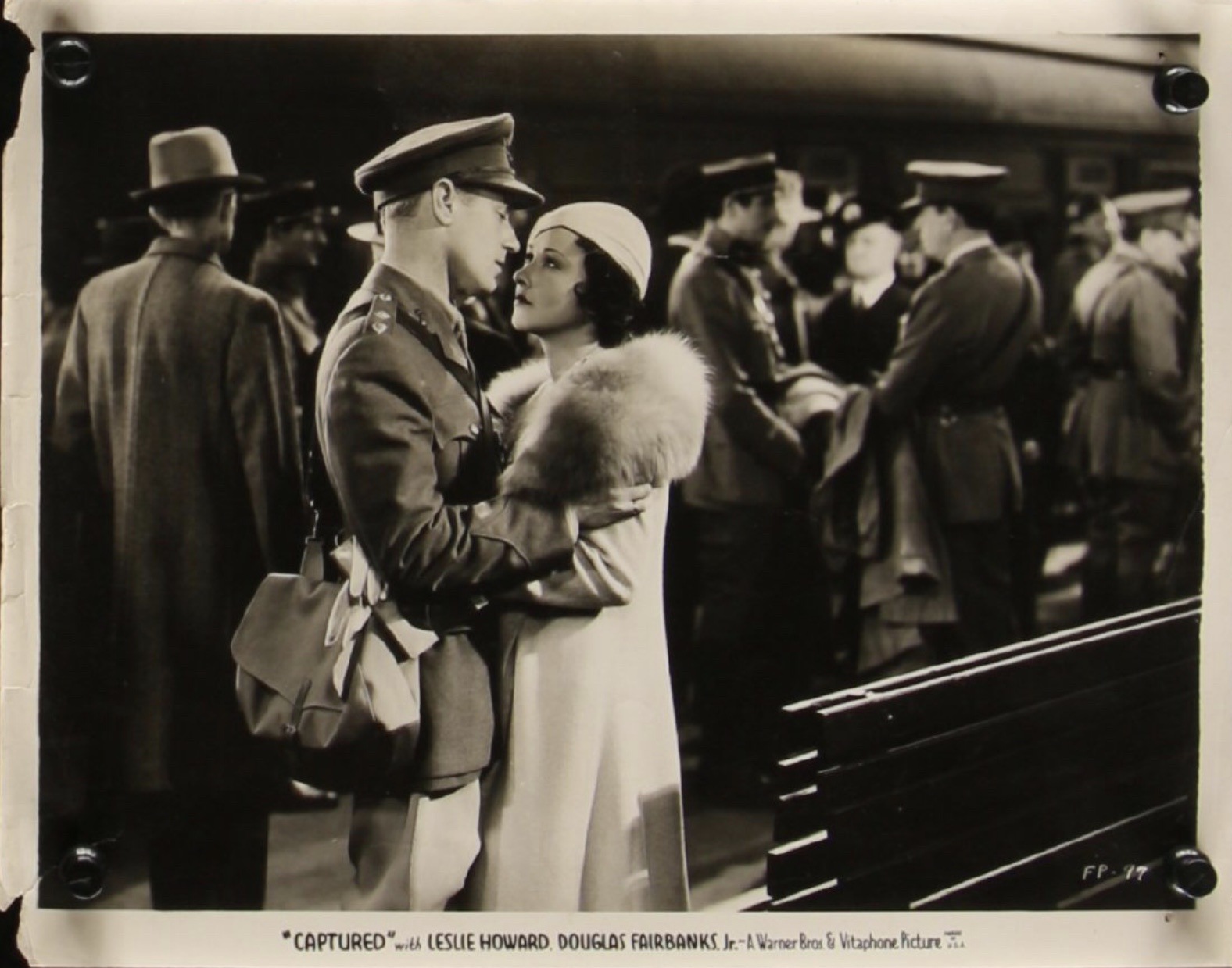 Leslie Howard and Margaret Lindsay in Captured! (1933)
