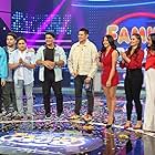 Dingdong Dantes, Rainier Castillo, Mark Herras, Katrina Halili, Nadine Samonte, Cristine Reyes, Anton Dela Paz, Jade Lopez, and Alvin Aragon in Family Feud Philippines (2022)