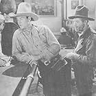 John Wayne, Edward Biby, and George 'Gabby' Hayes in The Man from Utah (1934)