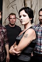 Mike Hogan, Noel Hogan, Fergal Lawler, Dolores O'Riordan, and The Cranberries