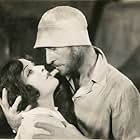 Jacqueline Logan and H.B. Warner in Stark Mad (1929)