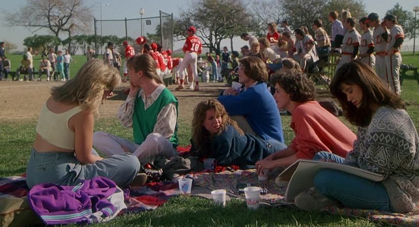 Demi Moore, Elizabeth Perkins, Megan Mullally, and Sachi Parker in About Last Night (1986)