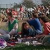 Demi Moore, Elizabeth Perkins, Megan Mullally, and Sachi Parker in About Last Night... (1986)