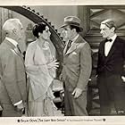 Cosmo Kyrle Bellew, Ivan F. Simpson, Conway Tearle, and Judith Vosselli in The Lady Who Dared (1930)