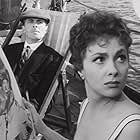 Gina Lollobrigida and Edward Underdown in Beat the Devil (1953)