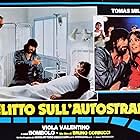 Enzo Andronico, Mario Donatone, Tomas Milian, and Viola Valentino in Delitto sull'autostrada (1982)