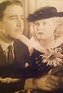 John Boles and Jean Muir in Orchids to You (1935)