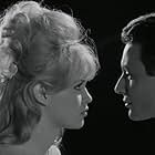 Brigitte Bardot and Michel Subor in Please, Not Now! (1961)
