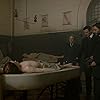 Daniel Brühl, Dakota Fanning, Luke Evans, and Matthew Shear in The Alienist (2018)