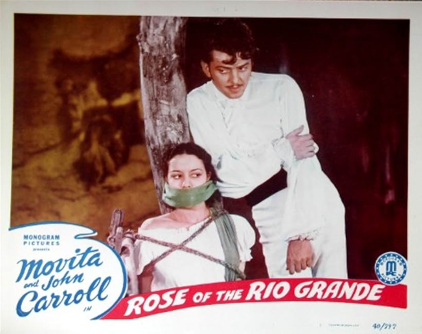 John Carroll and Movita in Rose of the Rio Grande (1938)