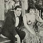 Theda Bara and Alan Roscoe in Camille (1917)