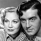 Gloria Dickson and John Payne in King of the Lumberjacks (1940)