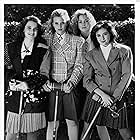 Winona Ryder, Shannen Doherty, Lisanne Falk, and Kim Walker in Heathers (1988)