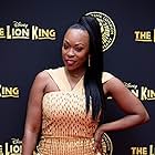 Dominique Moore at The Lion King 20 year anniversary